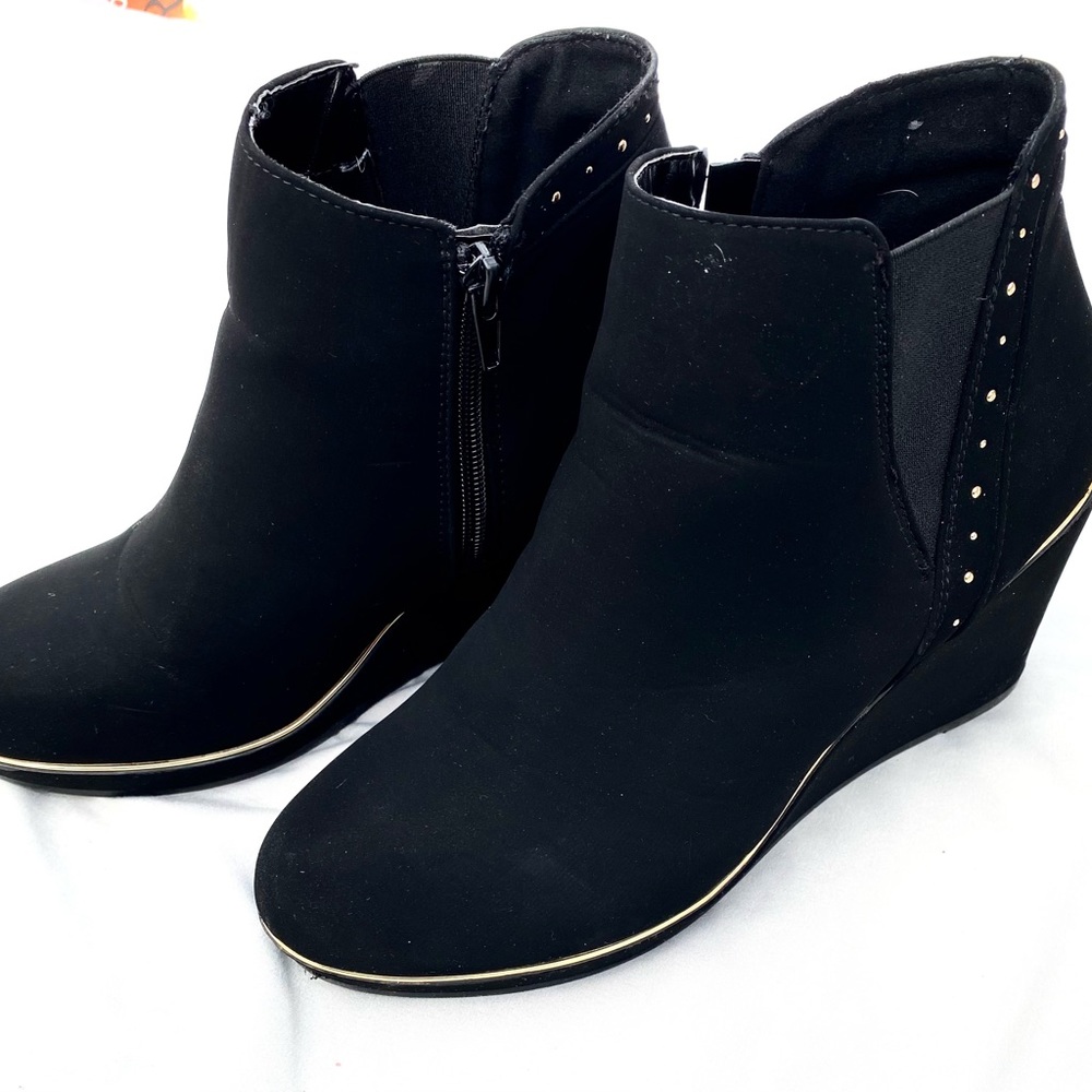 Black suede ankle boots with gold trim